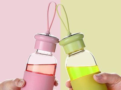 酷派玻璃水瓶硅胶提绳透明便携耐热加厚底部玻璃水瓶广告